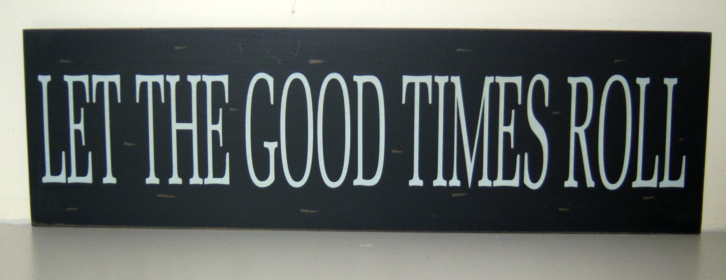 Black and White Wooden Wall Plaque/ Sign LET THE GOOD TIMES ROLL 48x14x1 cms