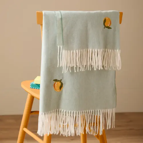 Fruits Lightweight Embroidered Throw 130x180cms in Sage with Zesty Orange